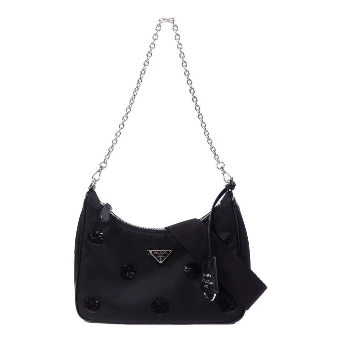 Prada Black Nylon Sequin Re-Edition 2005 Shoulder and Crossbody Bag 1BH204: Prada Black Nylon Sequin Re-Edition 2005 Shoulder and Crossbody Bag 1BH204 This PRADA Re-Edition 2005 2-way shoulder bag features a black nylon exterior with sequin detailing. Designed for women, the 
