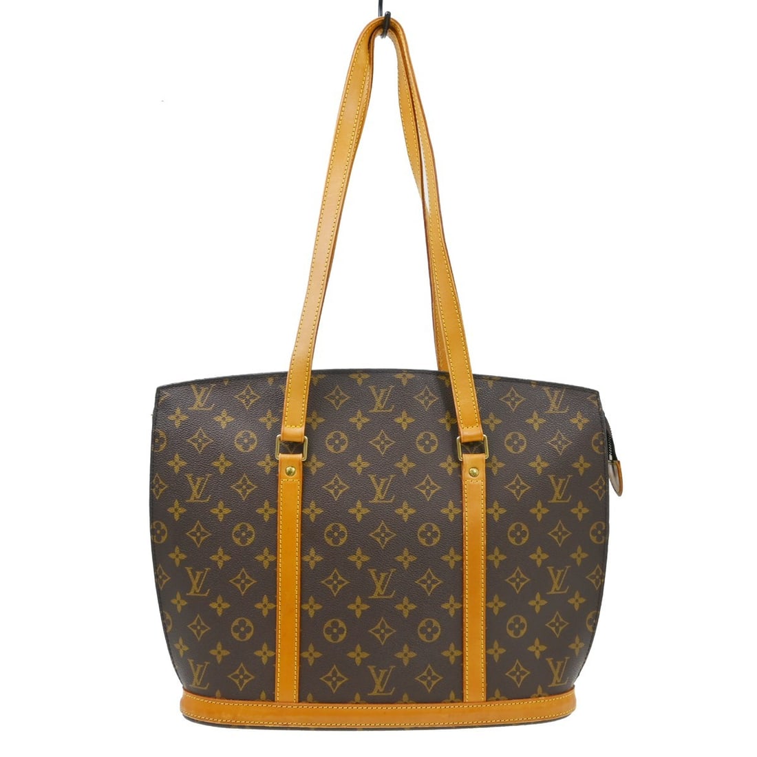 Louis Vuitton Babylone Monogram Canvas Tote Bag M51102: Louis Vuitton Babylone Monogram Canvas Tote Bag M51102 Vintage Louis Vuitton Babylone hand tote bag in brown Monogram canvas with leather trim and double handles. This large zip-top tote features a br