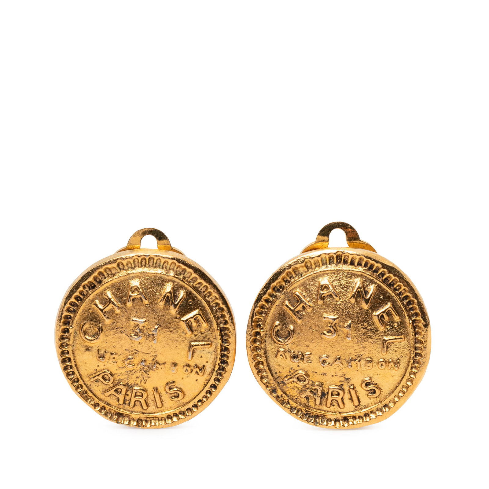 Chanel 31 Rue Cambon Gold Plated Round Clip Earrings: Chanel 31 Rue Cambon Gold Plated Round Clip Earrings These Chanel round clip-on earrings are crafted from gold-plated metal and feature the iconic 31 Rue Cambon design. Made in France, they offer a cl