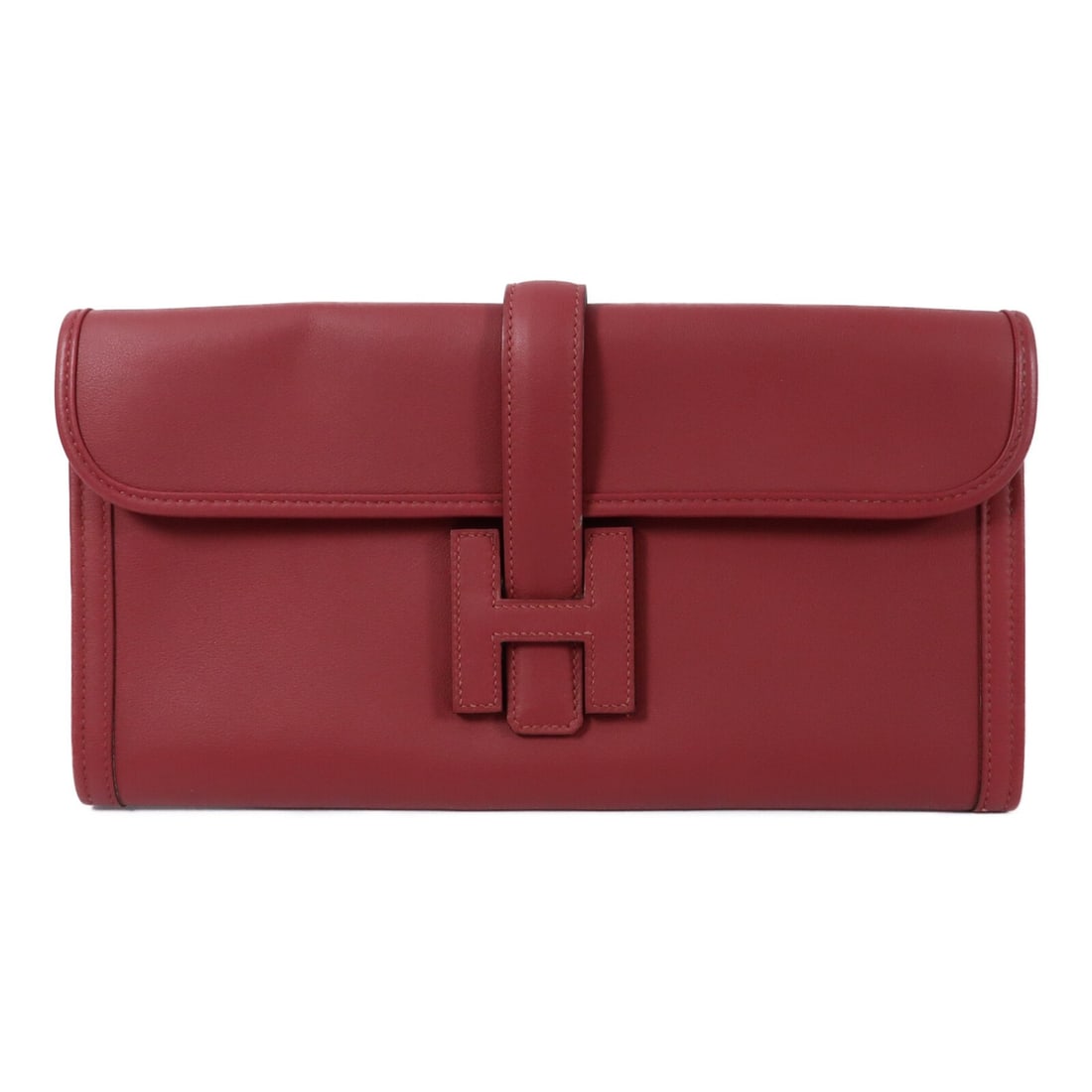 Hermes Jige Elan 29 Red Calfskin Clutch Bag in Veau Swift Leather: Hermes Jige Elan 29 Red Calfskin Clutch Bag in Veau Swift Leather This Hermes Jige Elan 29 clutch bag is crafted from Veau Swift leather in a rich Rouge Grenat red. Designed for women, it features a s