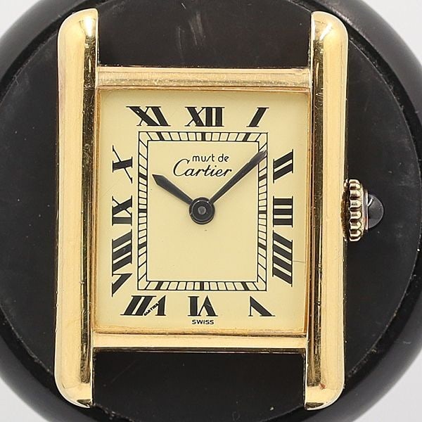 Cartier Must Tank Ladies Vintage Manual Wind SV925 Watch: Cartier Must Tank Ladies Vintage Manual Wind SV925 Watch This vintage Cartier Must Tank wristwatch is crafted for women and features a hand-winding movement. Made in Switzerland, it showcases Cartier'