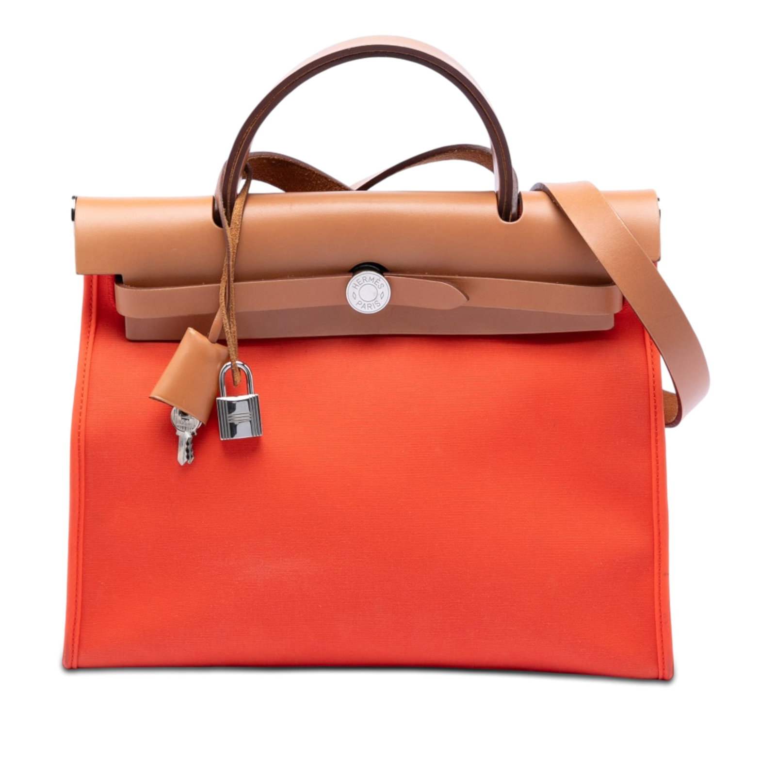 Hermes Toile Herbag Zip 31 Orange Canvas Bag: Hermes Toile Herbag Zip 31 Orange Canvas Bag The Hermes Toile Herbag Zip 31 is a stylish bag crafted from canvas with leather trim. It features a flat leather top handle, a flat leather shoulder strap
