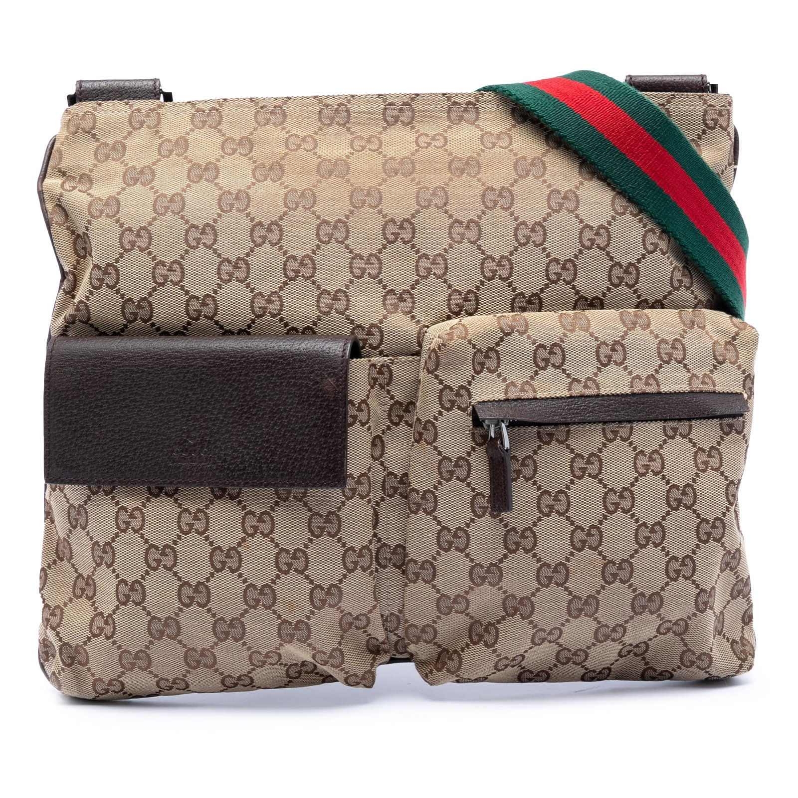 GG Canvas Web Crossbody Bag with Dual Front Pockets by Gucci: GG Canvas Web Crossbody Bag with Dual Front Pockets by Gucci This Gucci GG Canvas Web Double Pocket Crossbody bag features a beige canvas body with leather trim and an adjustable flat canvas shoulder 