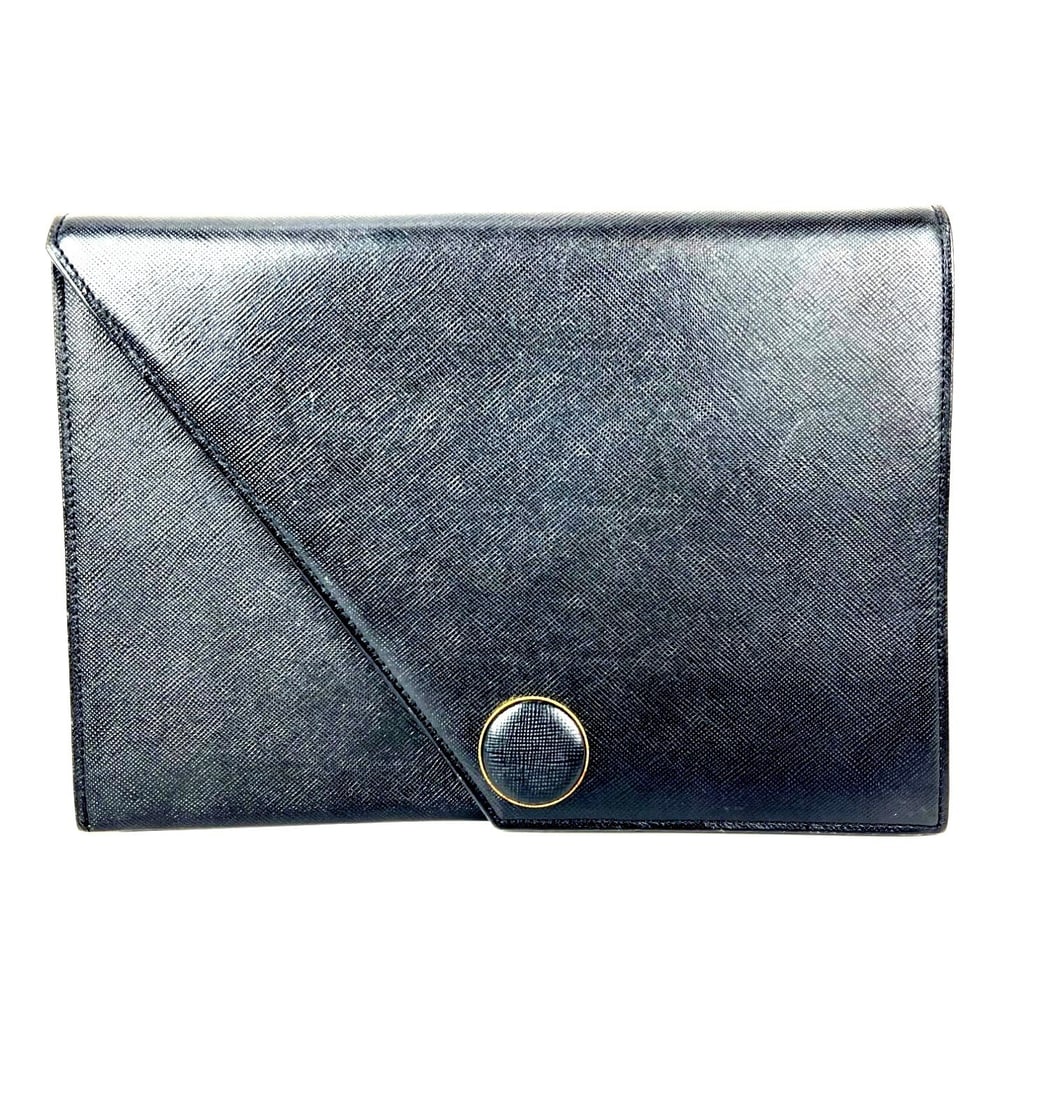 Saint Laurent black saffiano leather vintage clutch bag: Saint Laurent black saffiano leather vintage clutch bag This vintage Saint Laurent clutch bag features a sleek rectangular silhouette crafted from black Saffiano leather. The bag is accented with gold
