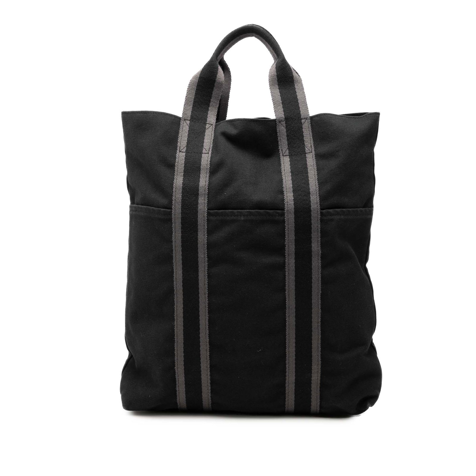Hermes Fourre Tout Cabas Black Canvas Tote Bag: Hermes Fourre Tout Cabas Black Canvas Tote Bag Hermes Toile Fourre Tout Cabas in black fabric with a practical open-top design and snap closure. This tote features flat handles, exterior front slip po