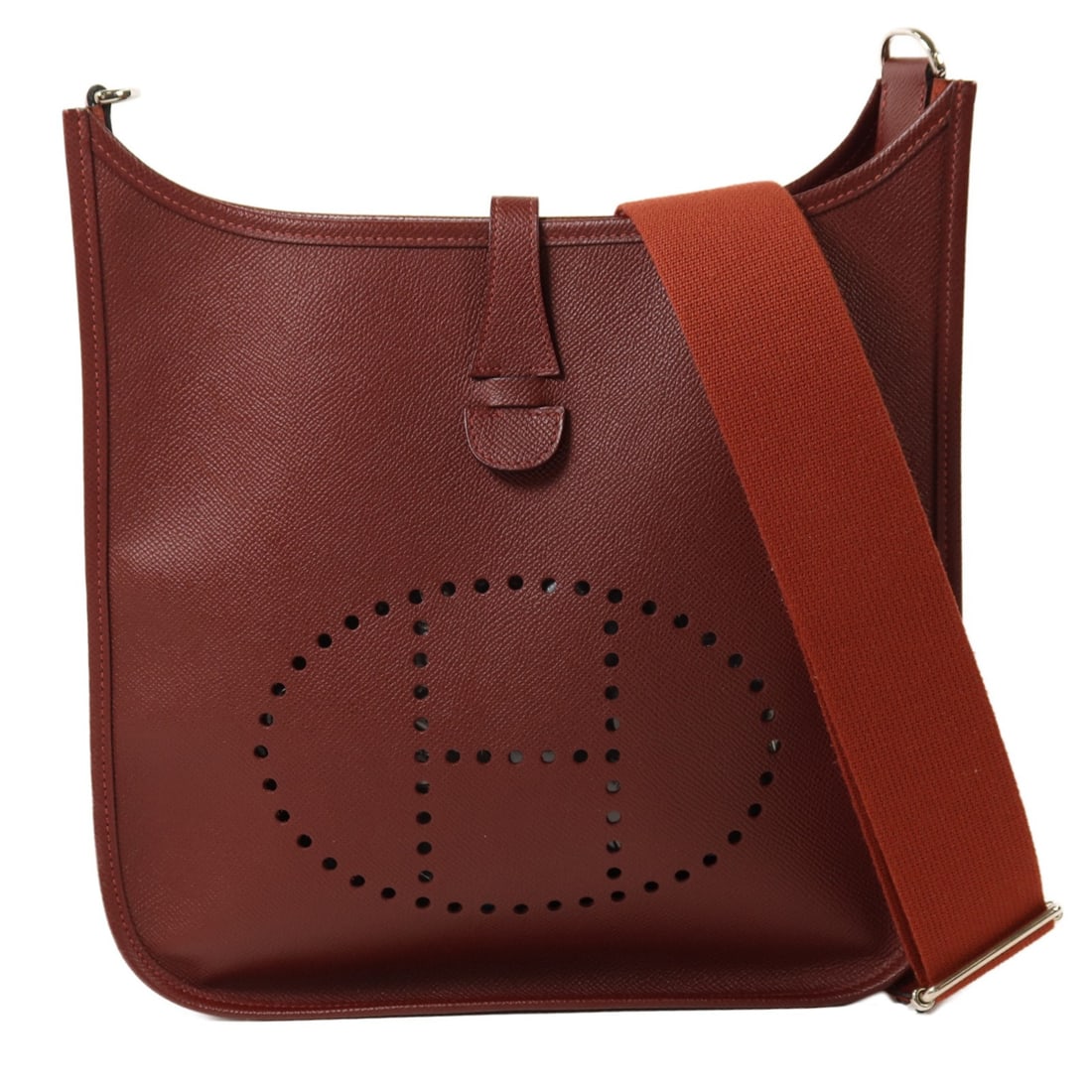 Hermes Evelyne PM Red Epsom Calfskin Shoulder Bag with Palladium Hardware: Hermes Evelyne PM Red Epsom Calfskin Shoulder Bag with Palladium Hardware The HERMES Evelyne PM is a stylish shoulder bag crafted from Veau Epsom calfskin leather in a striking red hue. Designed for e