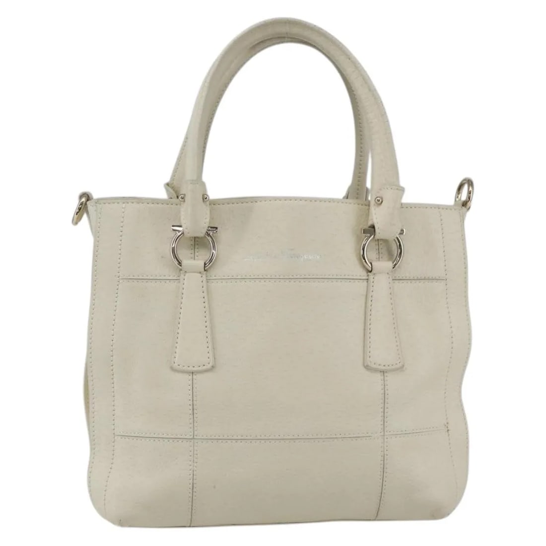 White Leather Handbag Salvatore Ferragamo Gancini Italy: White Leather Handbag Salvatore Ferragamo Gancini Italy This Salvatore Ferragamo Gancini handbag is crafted from white leather and designed for women. Made in Italy, it features a spacious interior an