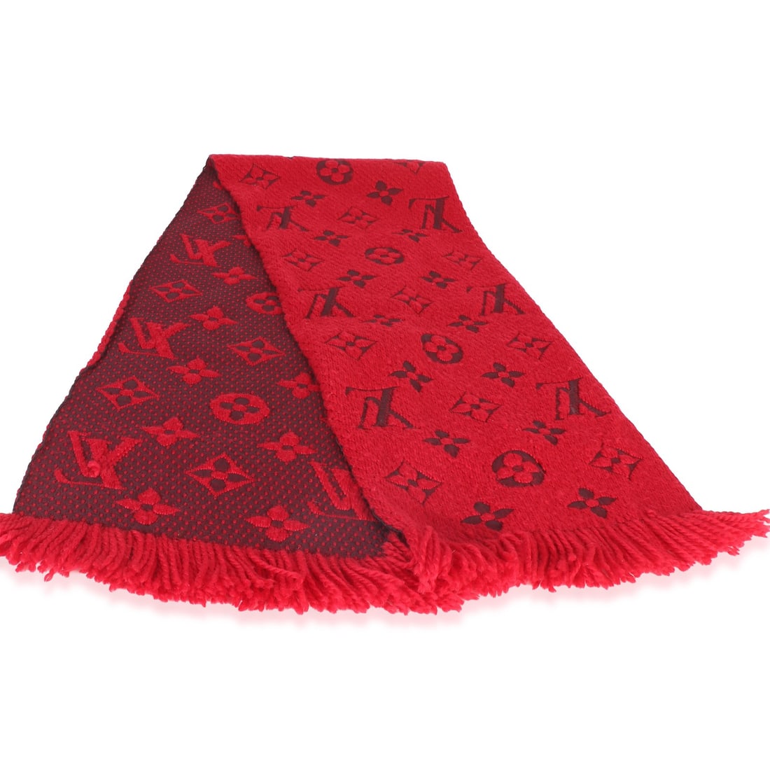 Louis Vuitton Logomania Fringe Scarf Red Wool 62 in: Louis Vuitton Logomania Fringe Scarf Red Wool 62 in This Louis Vuitton Logomania Fringe Scarf in red features the iconic monogram pattern and a stylish fringe detail. Crafted from fabric, it offers bo