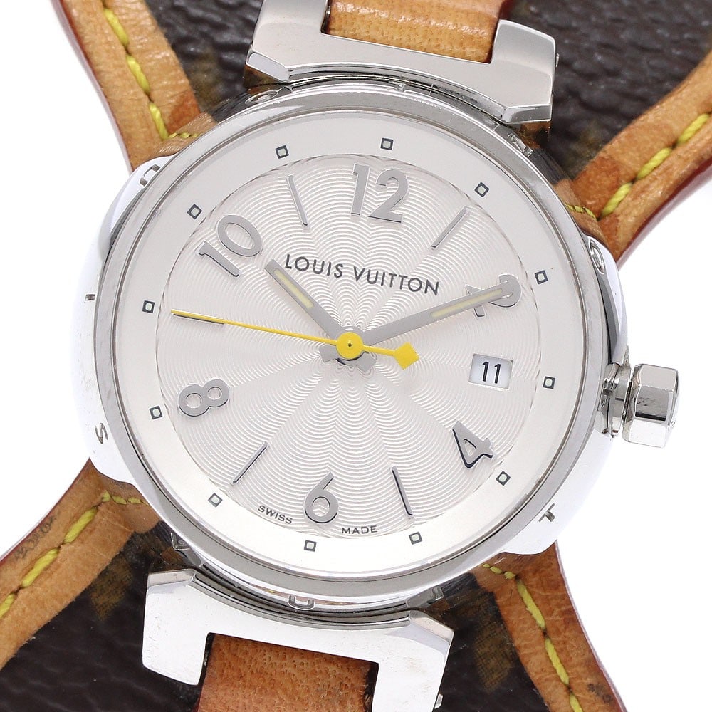 Louis Vuitton Tambour Quartz Date Womens Wristwatch Q121K: Louis Vuitton Tambour Quartz Date Womens Wristwatch Q121K This LOUIS VUITTON Tambour Date Quartz women's wristwatch features a stainless steel case and a silver dial, complemented by a leather strap. 
