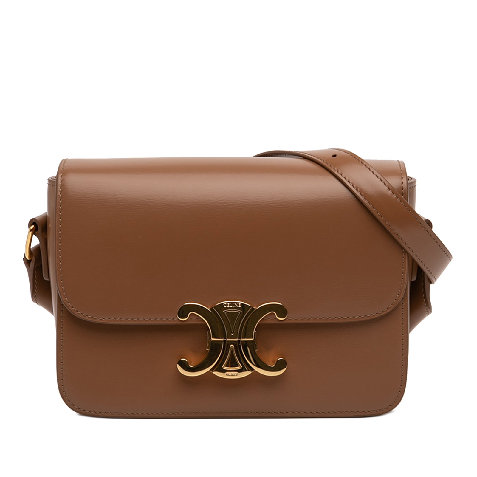 Celine Teen Triomphe Leather Crossbody Bag Brown: Celine Teen Triomphe Leather Crossbody Bag Brown Celine Teen Shiny Calfskin Triomphe Crossbody in brown leather with a flat shoulder strap, front flap, push-lock closure, and an interior slip pocket. 