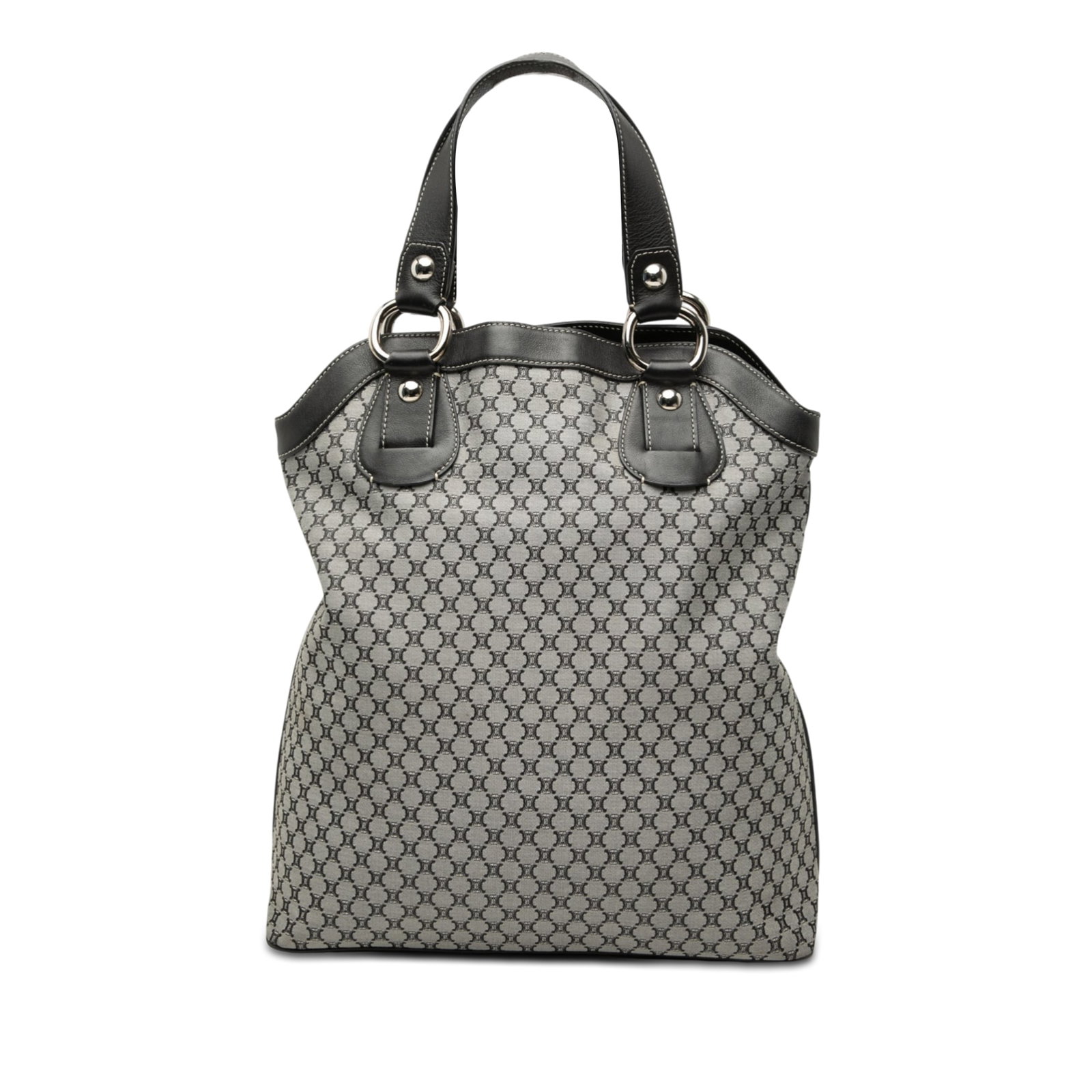 Celine Macadam Pattern Canvas Tote Bag with Leather Trim: Celine Macadam Pattern Canvas Tote Bag with Leather Trim The Celine Macadam Canvas Tote features a durable canvas body with leather trim and flat leather handles. It is designed with an open top and i