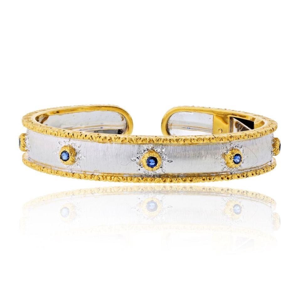 Buccellati Macri 18K Two Tone Bangle: Buccellati Macri 18K Two Tone Bangle This pre-owned Buccellati Macri bangle bracelet features an elegant two-tone 18K gold design. The piece combines classic craftsmanship with luxurious materials, ma