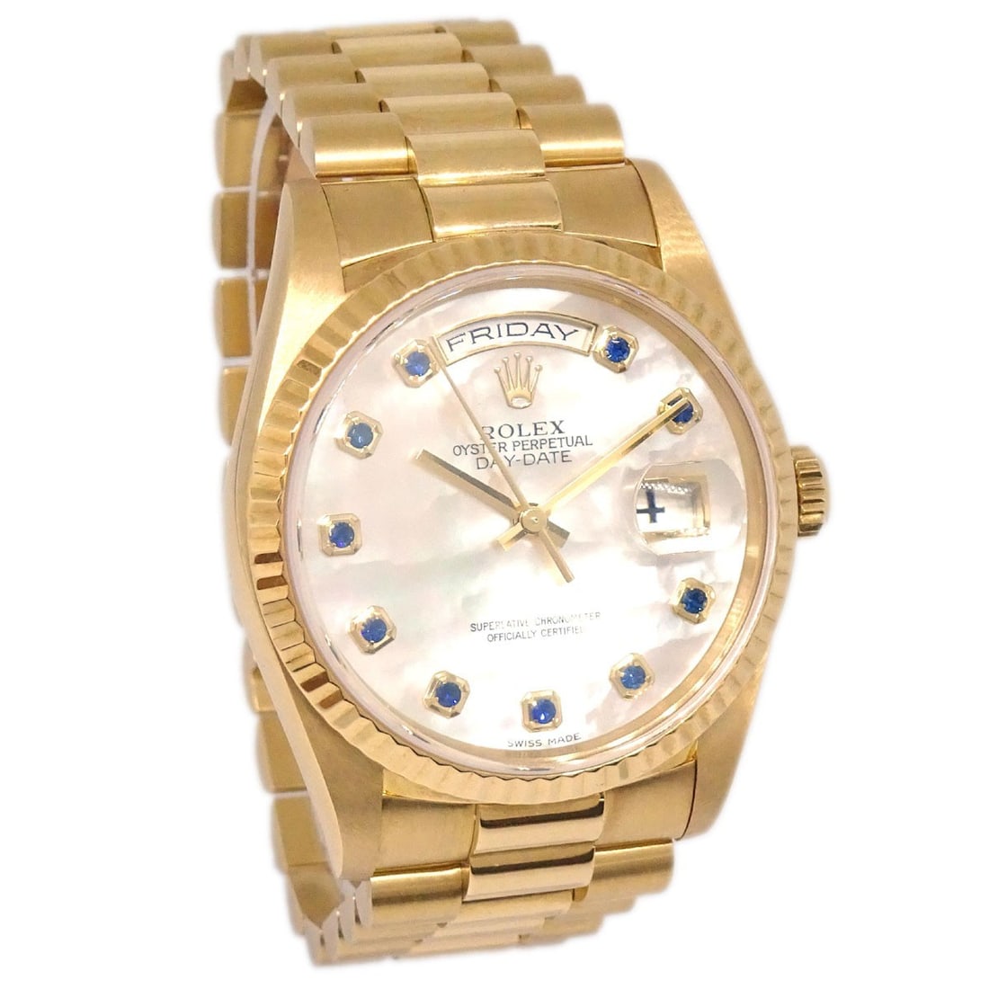 Rolex Ref 18238NGS Oyster Perpetual Daydate 36 mm 18KYG wristwatch: Rolex Ref 18238NGS Oyster Perpetual Daydate 36 mm 18KYG wristwatch Vintage Rolex Oyster Perpetual Day-Date wristwatch in 18K yellow gold with a pearl dial accented by 10 sapphire hour markers. This au