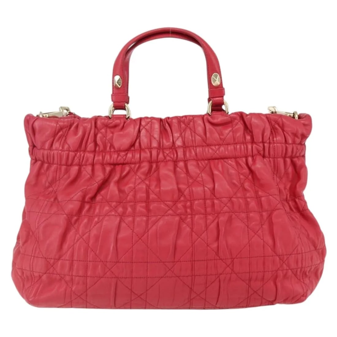 Red Leather Delices Tote by Christian Dior 31cm by 24cm by 9cm: Red Leather Delices Tote by Christian Dior 31cm by 24cm by 9cm Christian Dior Delices Tote in red leather designed for women. This Italian-made handbag features a quilted Cannage pattern and includes 