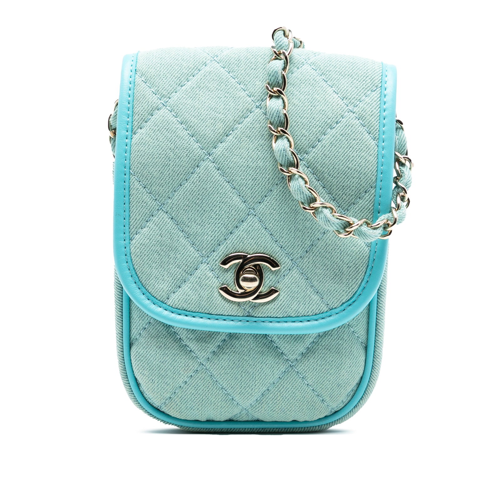 Chanel Mini Quilted Blue Denim Crossbody Bag with Leather Trim: Chanel Mini Quilted Blue Denim Crossbody Bag with Leather Trim This Chanel Mini CC Quilted Denim Crossbody features a quilted denim exterior with leather trim and a front flap secured by a twist lock 
