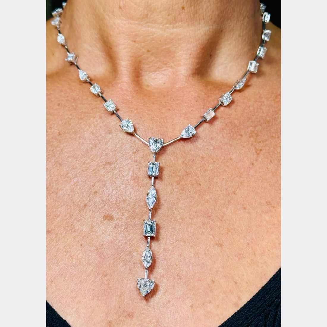 Platinum Necklace with 21.76 Ct GIA Certified Diamonds: Platinum Necklace with 21.76 Ct GIA Certified Diamonds This stunning platinum necklace features a remarkable total of 21.76 carats of GIA Certified diamonds, showcasing a luxurious blend of shapes and