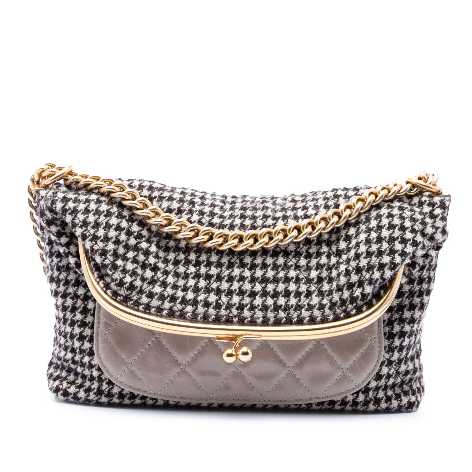 Chanel Tabatiere Kisslock Crossbody Medium Quilted Tweed Calfskin: Chanel Tabatiere Kisslock Crossbody Medium Quilted Tweed Calfskin Medium Chanel Tabatiere fold-over crossbody bag in quilted houndstooth tweed and calfskin. It features a chain and leather strap, a fl