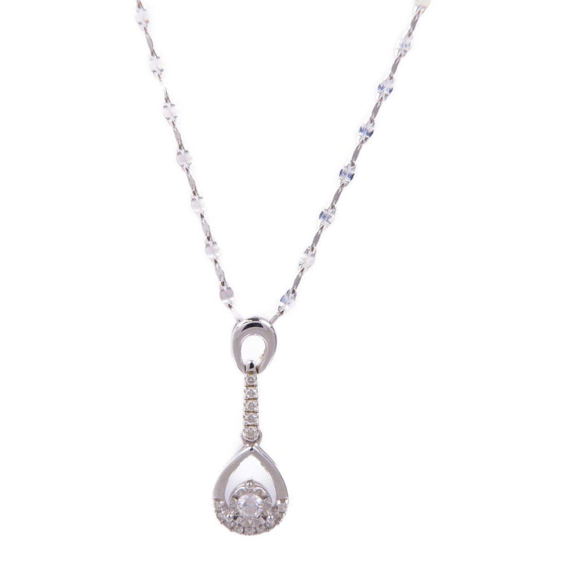 Diamond Pendant Necklace in 18K White Gold: Diamond Pendant Necklace in 18K White Gold This exquisite necklace features a stunning design crafted from 18K white gold, showcasing the brilliance of a diamond as the main stone. The necklace is a p