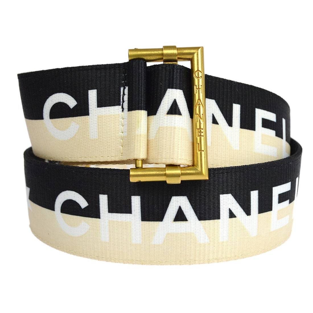 Chanel 01S adjustable waist belt black ivory nylon: Chanel 01S adjustable waist belt black ivory nylon Adjustable Chanel waist belt in black and ivory nylon with a CC logo buckle. Made in France, this women's belt comes with its box and shows reasonabl