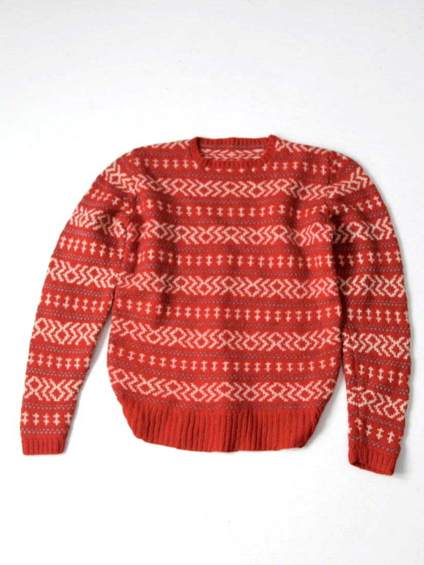 1980s Vintage Red Wool Fair Isle Ski Sweater Men's L: 1980s Vintage Red Wool Fair Isle Ski Sweater Men's L Embrace the charm of the 1980s with this vintage Christmas Fair Isle ski sweater. Hand-knit from warm red wool, this pullover features a classic cr