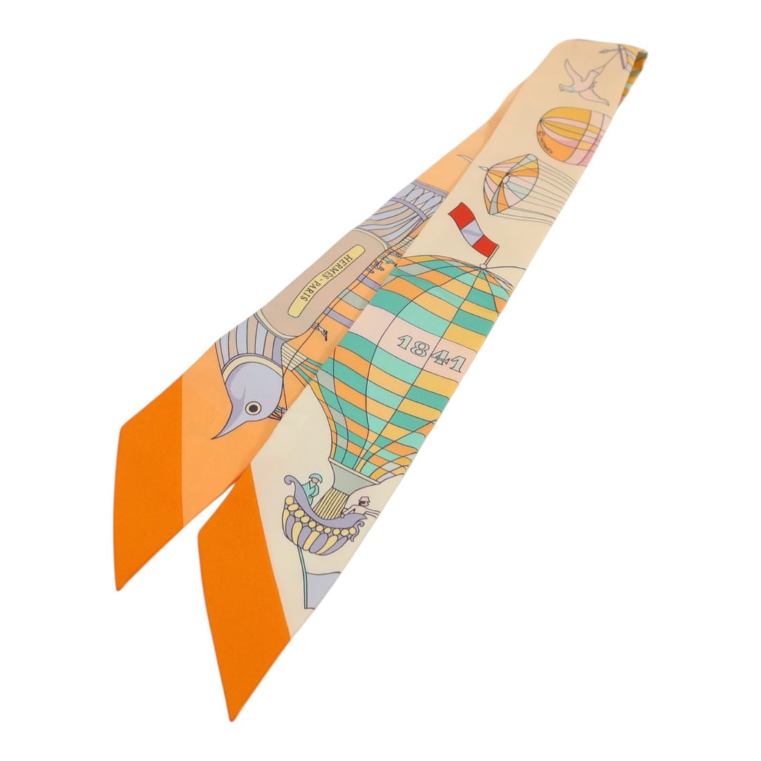 Hermes Silk Twilly Orange Green Multicolor Women's Scarf: Hermes Silk Twilly Orange Green Multicolor Women's Scarf This Hermes Twilly scarf is crafted from luxurious silk and features a vibrant orange, green, and multicolor design. Made in France, it is desi