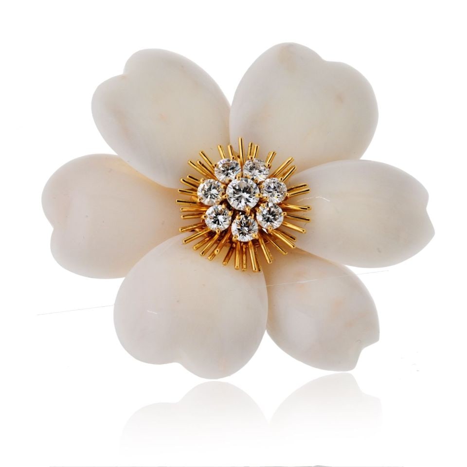 Van Cleef & Arpels 18K Gold Rose de Noel Brooch with White Coral and Diamonds: Van Cleef & Arpels 18K Gold Rose de Noel Brooch with White Coral and Diamonds This exquisite Van Cleef & Arpels brooch is a stunning representation of the iconic Rose de Noel collection. Crafted from 