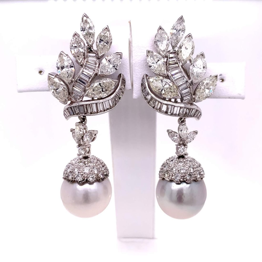 Platinum Diamond Earrings with South Sea Pearls 9.50Ct 2.25 inches: Platinum Diamond Earrings with South Sea Pearls 9.50Ct 2.25 inches Elevate your elegance with these stunning Platinum Diamond and South Sea Pearl Earrings. Expertly crafted, these earrings feature a l