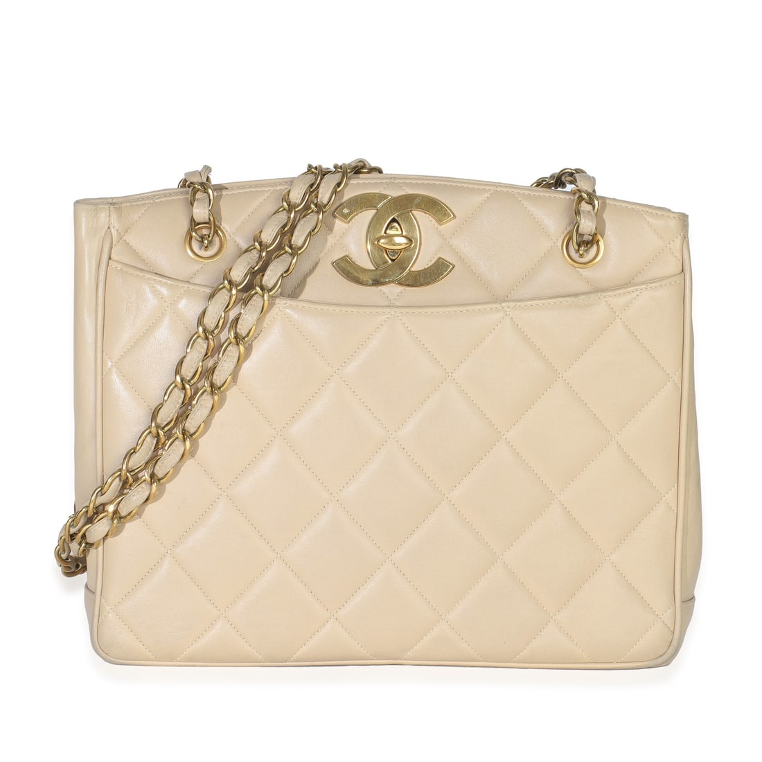 Chanel CC Shoulder Tote Beige Quilted Lambskin Vintage Handbag France: Chanel CC Shoulder Tote Beige Quilted Lambskin Vintage Handbag France This Chanel Vintage CC Shoulder Tote features a beige quilted lambskin leather exterior and gold-tone hardware. The bag includes a