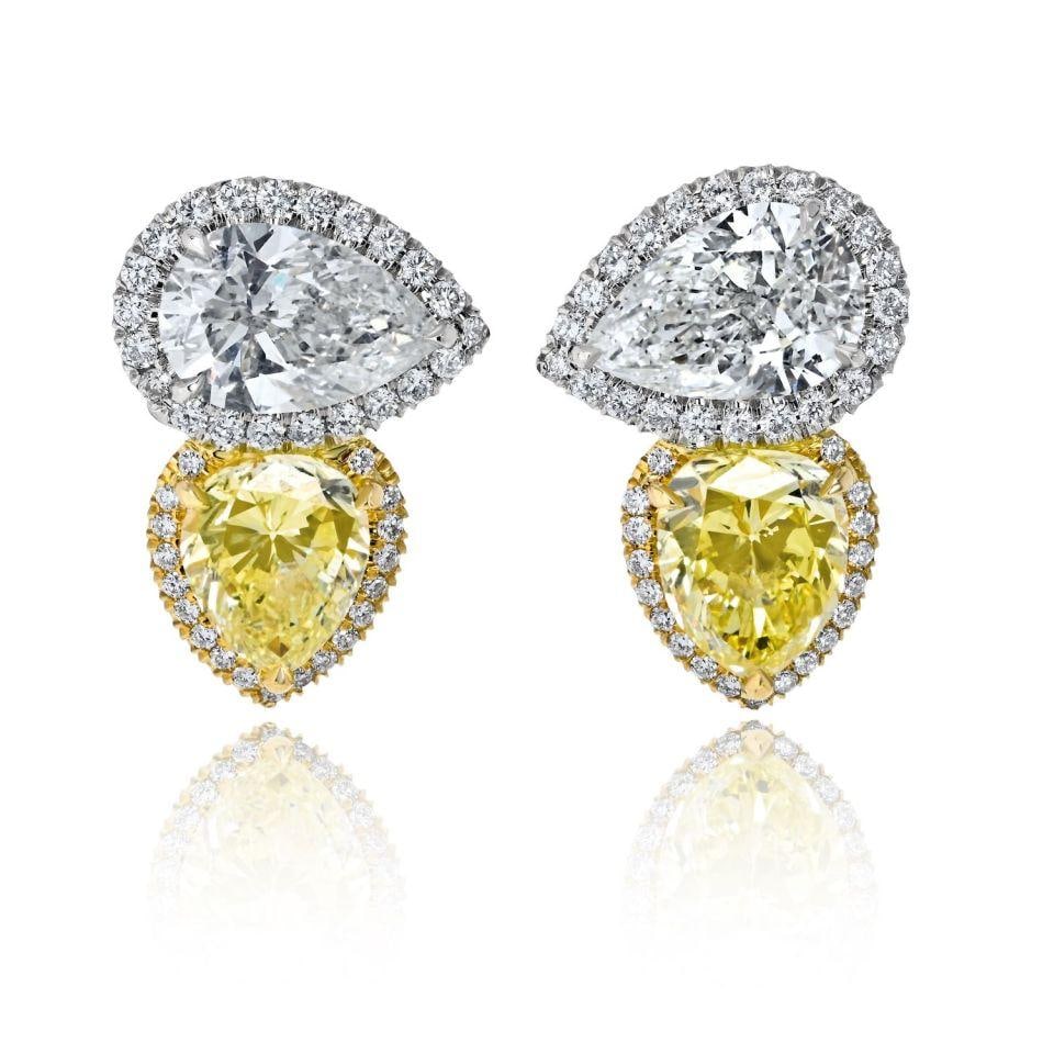 Diamond Earrings in Platinum and 18K Yellow Gold 7.76 Cts: Diamond Earrings in Platinum and 18K Yellow Gold 7.76 Cts Pre-owned earrings crafted in platinum and 18K yellow gold, featuring a total exact diamond weight of 7.76 cts. Additional diamond details are