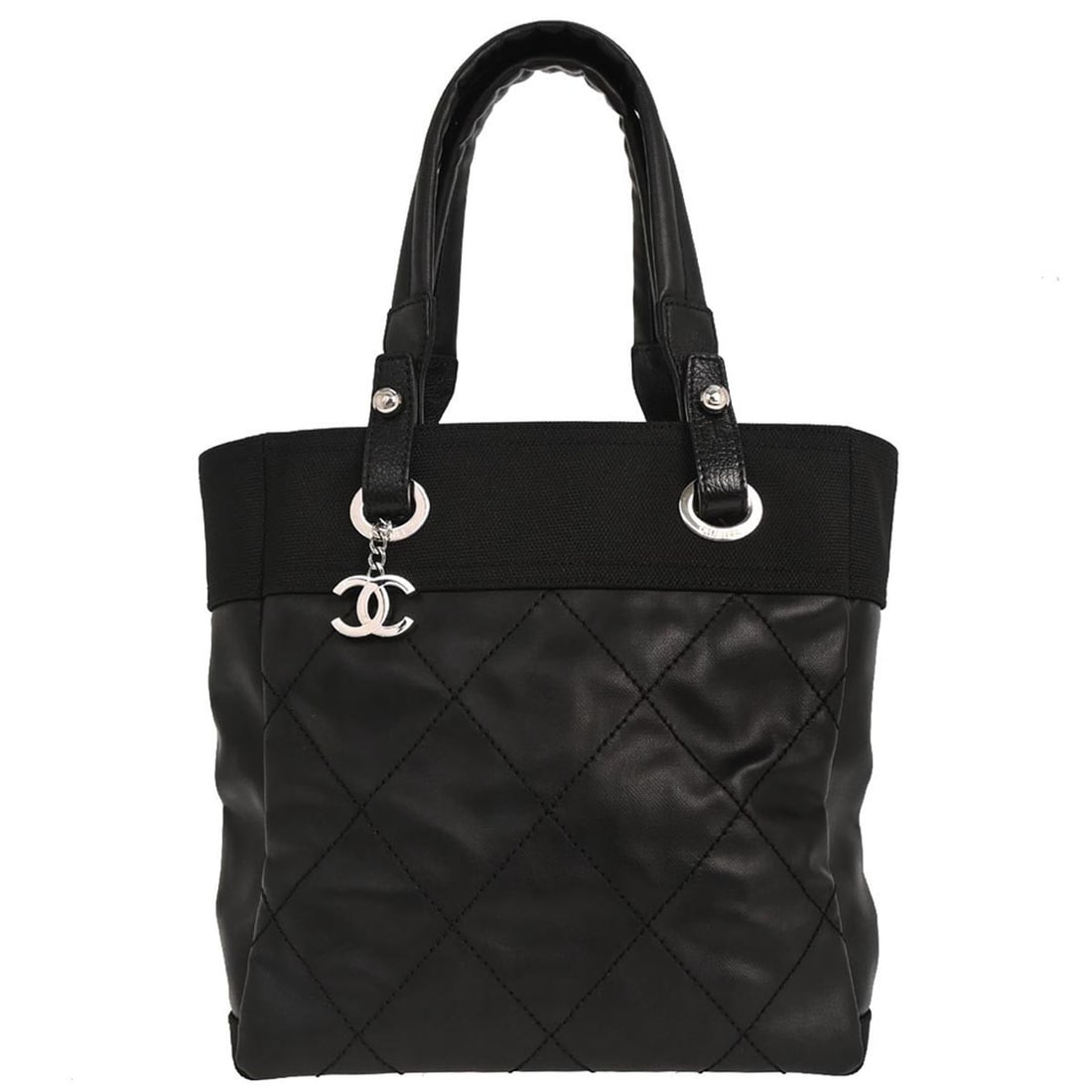 CHANEL Paris-Biarritz PM Black Canvas Tote Bag: CHANEL Paris-Biarritz PM Black Canvas Tote Bag Chanel Paris-Biarritz Tote PM handbag in black canvas with double handles and zip closure. This medium tote features logo accents, inner pockets, and a b