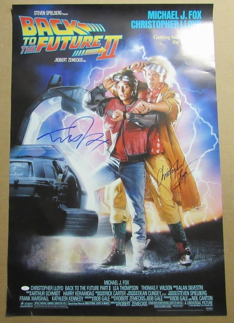 Michael J Fox Christopher Lloyd Signed 27x40 Back to Future II Poster JSA Certified: Michael J Fox Christopher Lloyd Signed 27x40 Back to Future II Poster JSA Certified This is an authentic autographed poster featuring Michael J. Fox and Christopher Lloyd from the iconic film "Back to