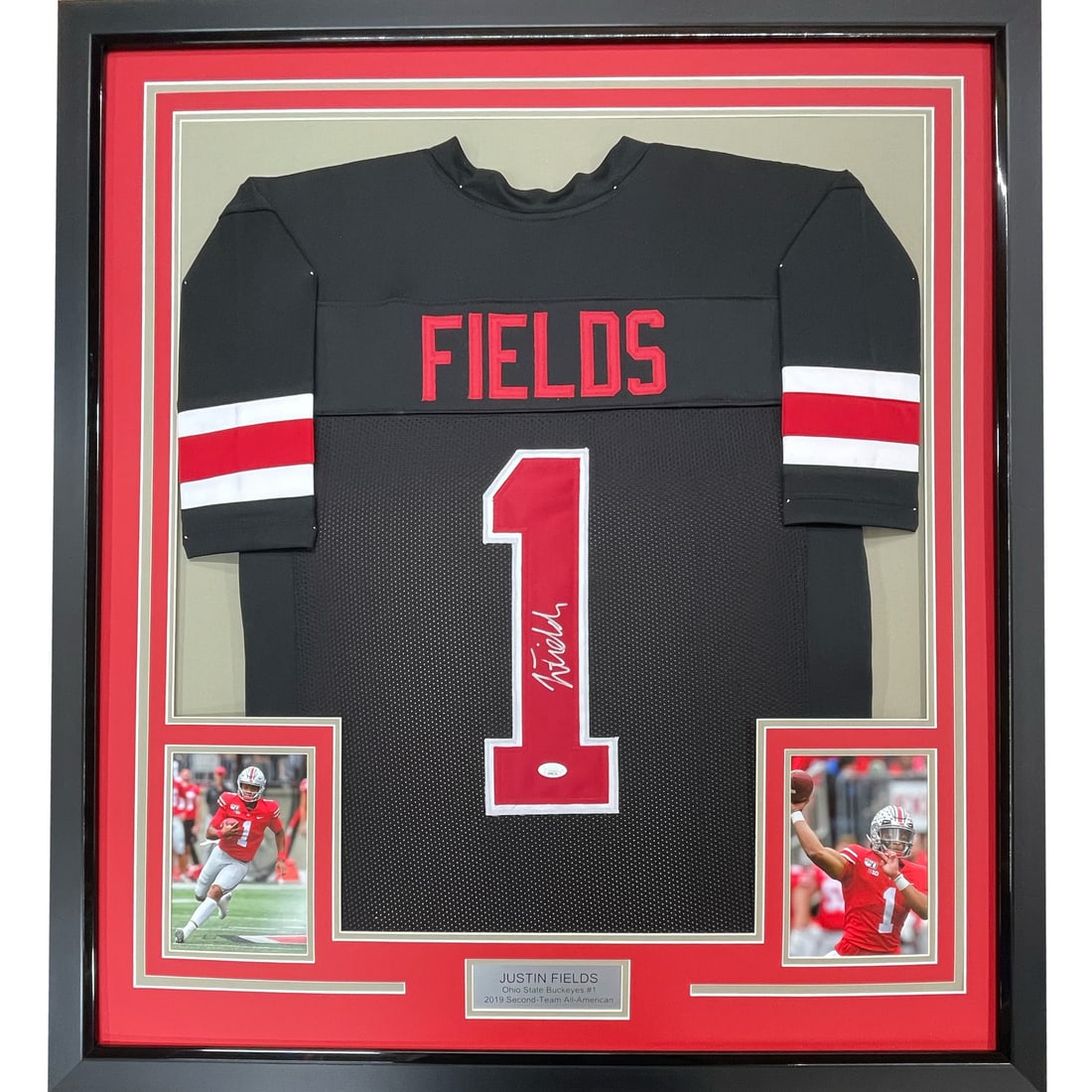 Framed Justin Fields Ohio State Black Jersey BAS COA 33x42: Framed Justin Fields Ohio State Black Jersey BAS COA 33x42 This professionally framed and matted Ohio State Buckeyes black jersey is autographed by Justin Fields. The display includes two 8x10 photogr