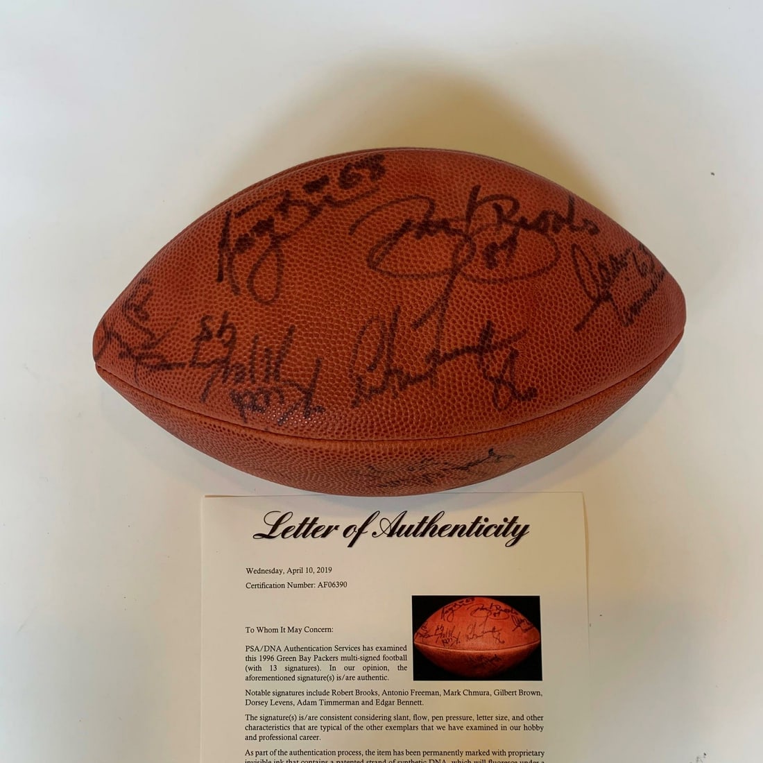 Wilson NFL football signed by 1996 Packers Super Bowl champs PSA DNA COA: Wilson NFL football signed by 1996 Packers Super Bowl champs PSA DNA COA This Wilson NFL football is signed by the 1996 Green Bay Packers Super Bowl Champions team. The ball comes with PSA/DNA authent