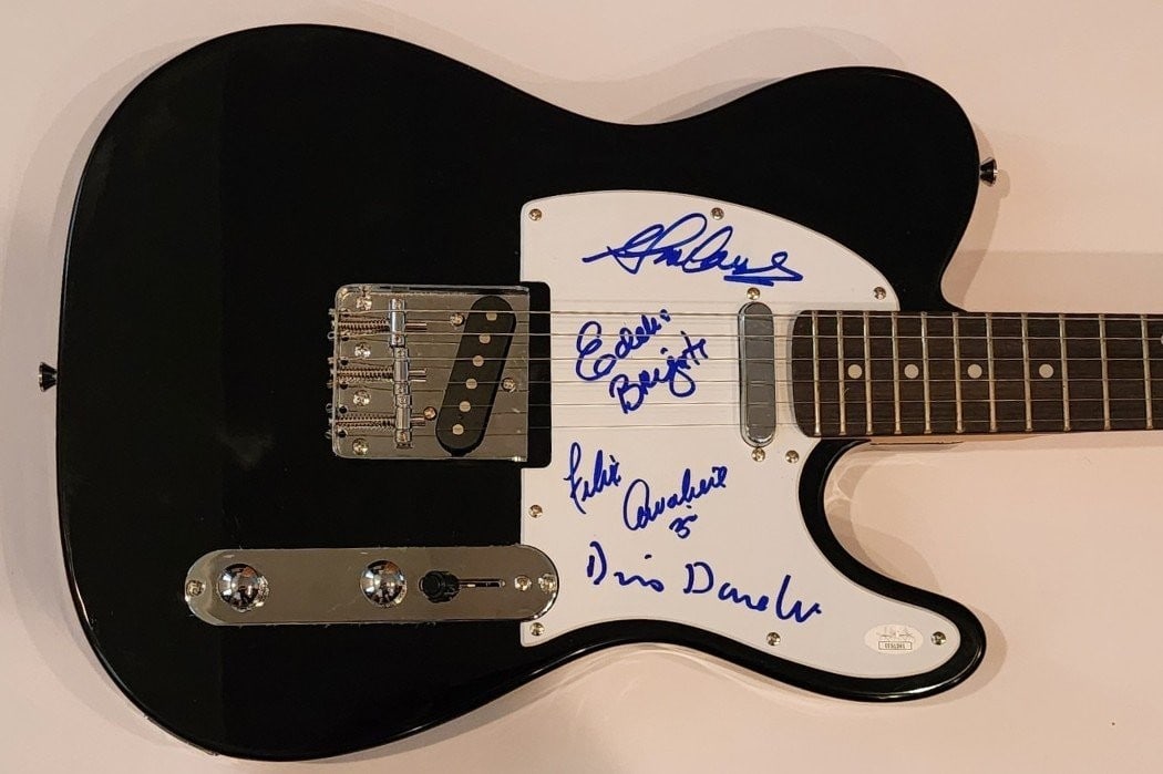 The Young Rascals Autographed Electric Guitar JSA Authenticated: The Young Rascals Autographed Electric Guitar JSA Authenticated This is a pre-owned electric guitar autographed by members of the legendary band, The Young Rascals. The signatures include Felix Cavali