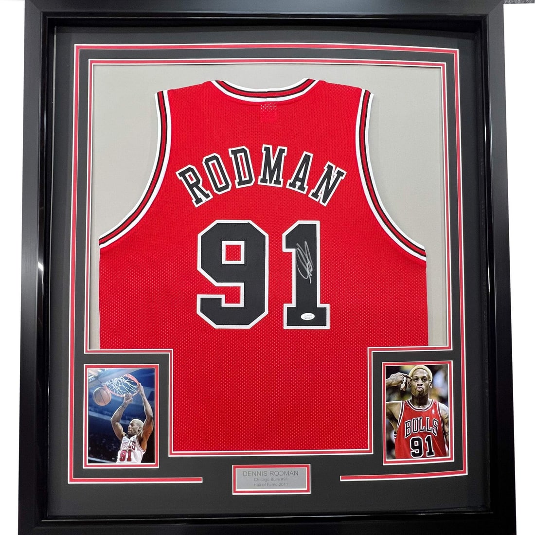 Framed Autographed Dennis Rodman Chicago Bulls Jersey JSA COA 33x42: Framed Autographed Dennis Rodman Chicago Bulls Jersey JSA COA 33x42 This professionally framed and matted piece features an authentic autographed jersey of basketball star Dennis Rodman, celebrating h