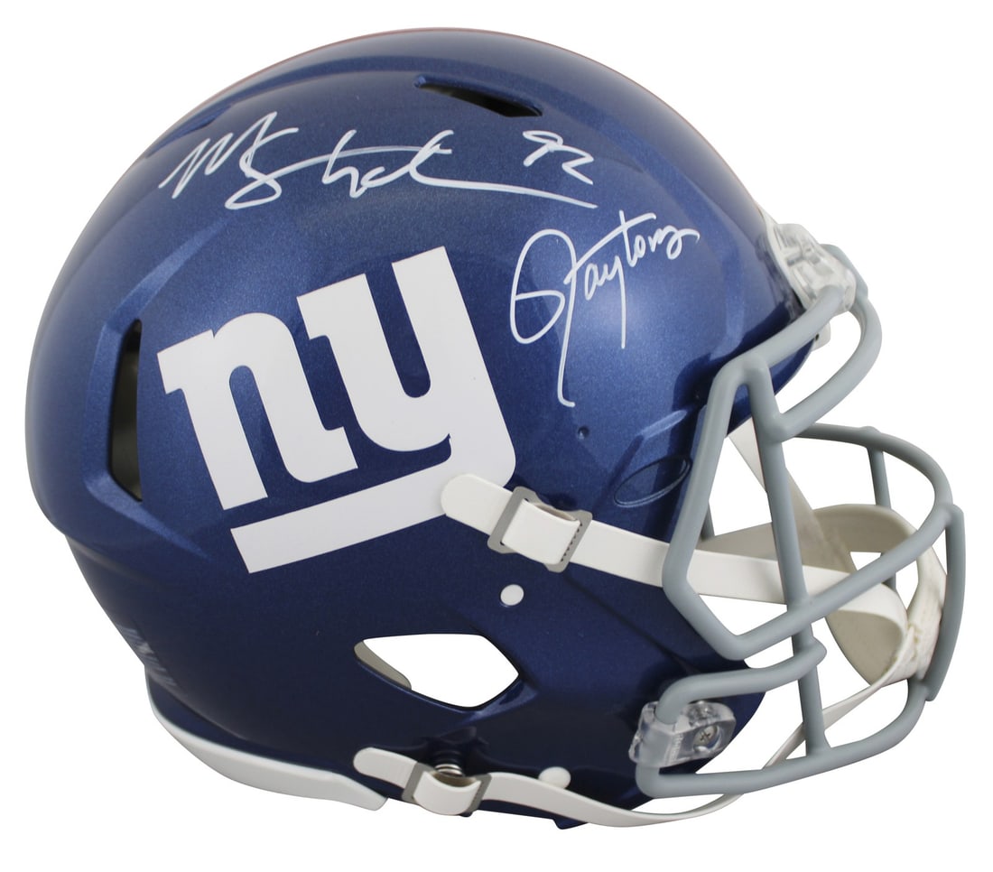 Lawrence Taylor Michael Strahan Signed Giants Helmet HOF Inscription Beckett Authenticated: Lawrence Taylor Michael Strahan Signed Giants Helmet HOF Inscription Beckett Authenticated Celebrate the legacy of the New York Giants with this Authentic Full Size Speed Proline Helmet, personally si