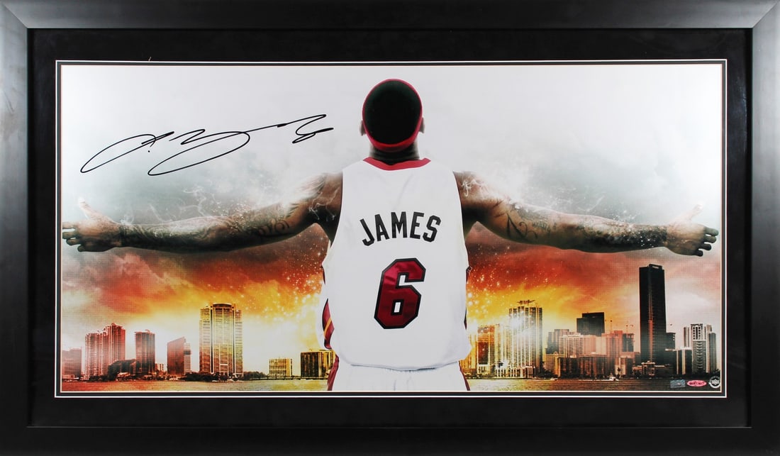 Framed 18x36 LeBron James signed Heat photo UDA authenticated: Framed 18x36 LeBron James signed Heat photo UDA authenticated This framed 18x36-inch photo features an authentic autograph by LeBron James of the Miami Heat. The piece has been professionally framed t