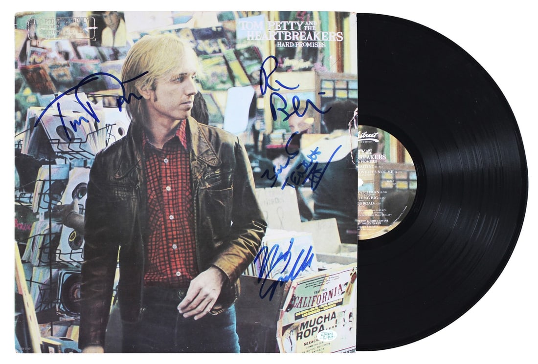 Autographed Hard Promises vinyl cover by Tom Petty and the Heartbreakers JSA: Autographed Hard Promises vinyl cover by Tom Petty and the Heartbreakers JSA This original "Hard Promises" album cover with vinyl has been personally signed by Tom Petty, Ron Blair, Mike Campbell, and
