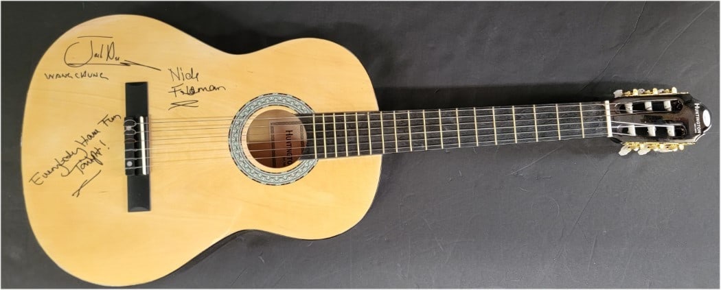 Autographed Acoustic Guitar Signed by Wang Chung with JSA Authentication: Autographed Acoustic Guitar Signed by Wang Chung with JSA Authentication This is a pre-owned acoustic guitar and guitar pick, originally from the United States, autographed by Jack Hues and Nick Fiedm
