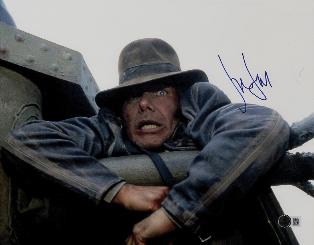 Harrison Ford Indiana Jones signed Beckett authenticated 11x14 photo: Harrison Ford Indiana Jones signed Beckett authenticated 11x14 photo This 11x14 photo features Harrison Ford as Indiana Jones and is hand-signed by the actor. The autograph has been authenticated by B