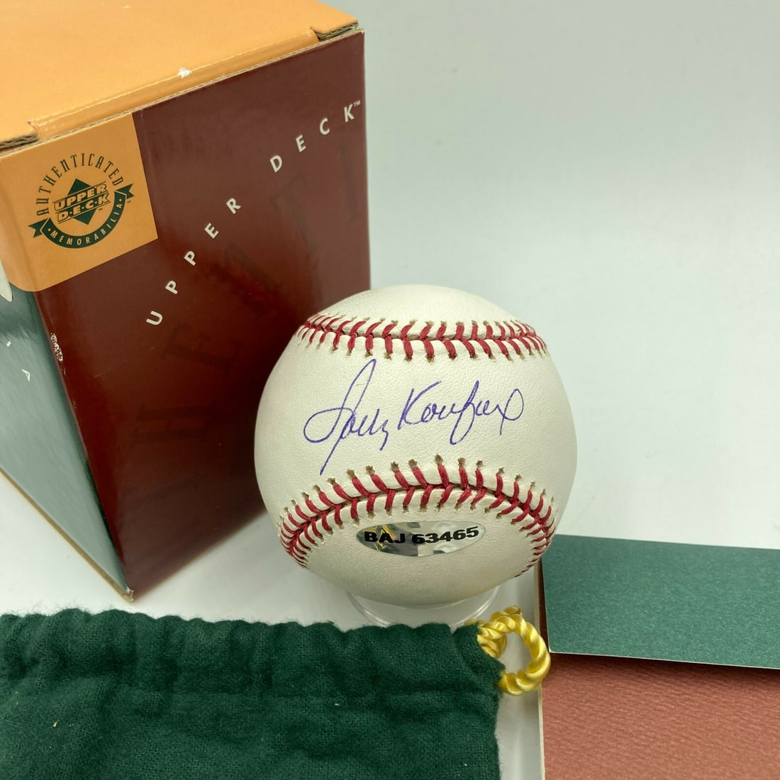 Sandy Koufax Signed MLB Baseball with Upper Deck COA: Sandy Koufax Signed MLB Baseball with Upper Deck COA This is a Major League Baseball signed by the legendary Sandy Koufax, featuring a UDA Upper Deck Authentic Certificate of Authenticity. The ball is
