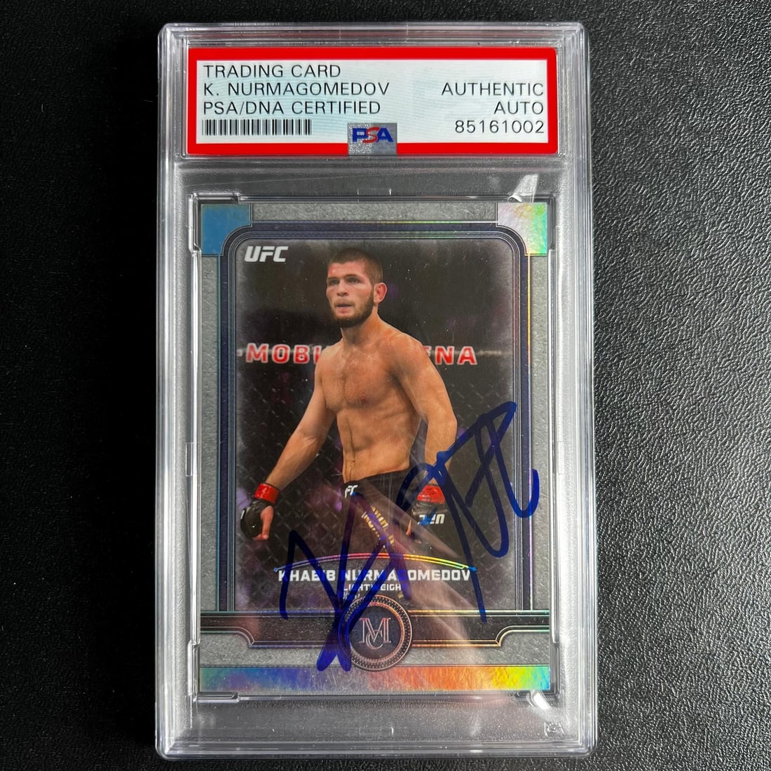 Khabib Nurmagomedov PSA Autographed 2019 Topps Museum #15 UFC Card: Khabib Nurmagomedov PSA Autographed 2019 Topps Museum #15 UFC Card This is a 2019 UFC Topps Museum Collection #15 sports trading card featuring Khabib Nurmagomedov. The card is autographed by Khabib N