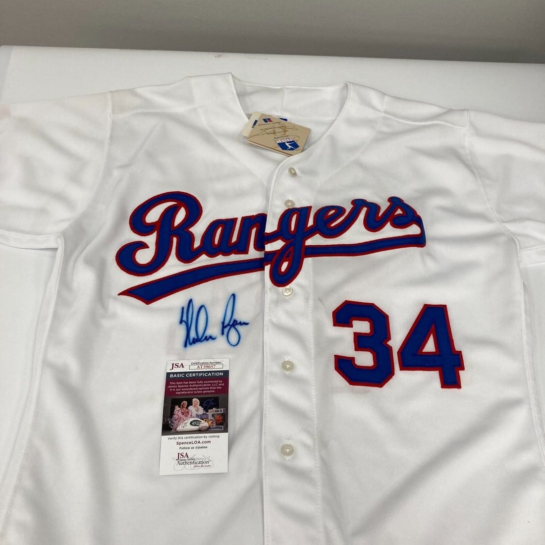 Nolan Ryan Signed Russell Texas Rangers Jersey JSA Certified: Nolan Ryan Signed Russell Texas Rangers Jersey JSA Certified This vintage Russell authentic jersey, featuring the iconic Nolan Ryan, is a must-have for any baseball fan. The jersey is signed by the le