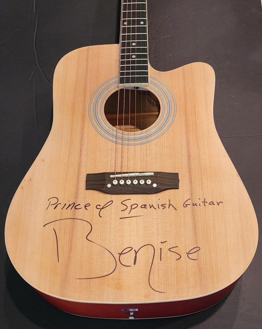 Benise Autographed Acoustic Guitar Prince of Spanish Guitar Beckett Certified: Benise Autographed Acoustic Guitar Prince of Spanish Guitar Beckett Certified This acoustic guitar, signed by Benise, is an exquisite piece for any music enthusiast. It is authenticated by Beckett, en