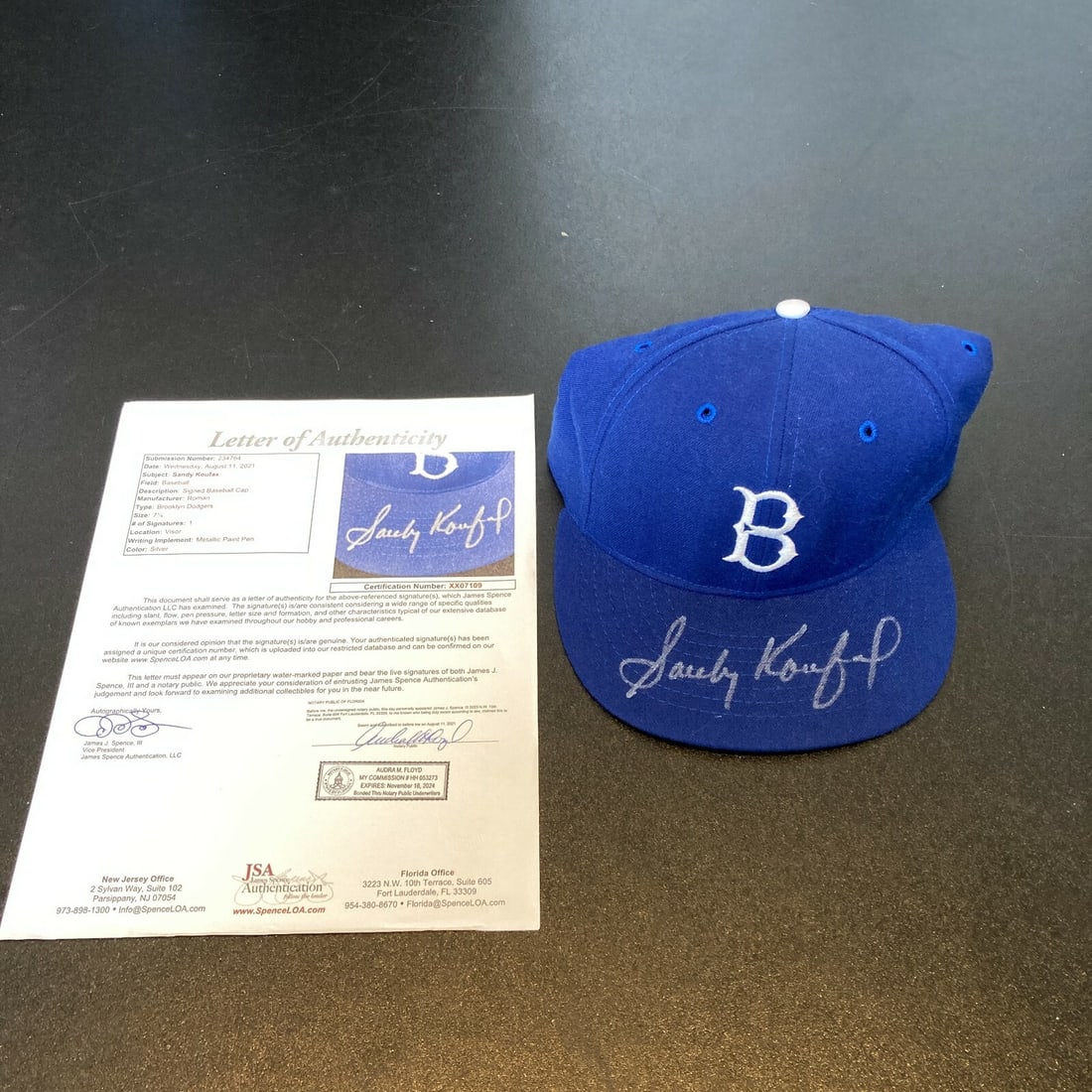 Sandy Koufax Signed Brooklyn Dodgers Hat with JSA COA: Sandy Koufax Signed Brooklyn Dodgers Hat with JSA COA Celebrate baseball history with this original Brooklyn Dodgers game model baseball hat, beautifully signed by legendary player Sandy Koufax. This 