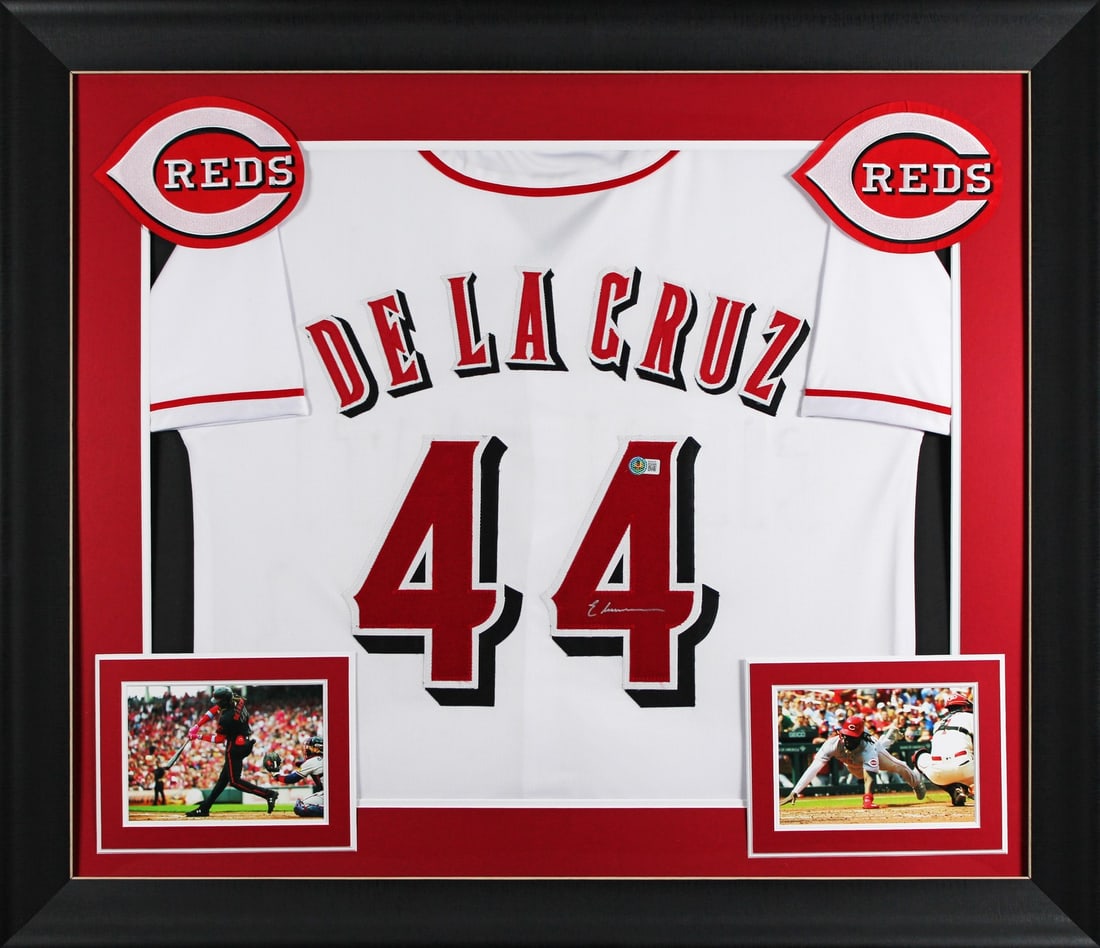 Elly De La Cruz Signed Framed Jersey Cincinnatti Reds BAS Authentication: Elly De La Cruz Signed Framed Jersey Cincinnatti Reds BAS Authentication This Elly De La Cruz signed white pro style framed jersey is a must-have for any Cincinnati Reds fan. Personally signed by the 