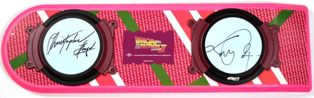 Back to the Future hoverboard photo Beckett signed by Lloyd and Fox: Back to the Future hoverboard photo Beckett signed by Lloyd and Fox This is a photograph featuring the iconic hoverboard from the movie "Back to the Future," autographed by both Michael J. Fox and Chr
