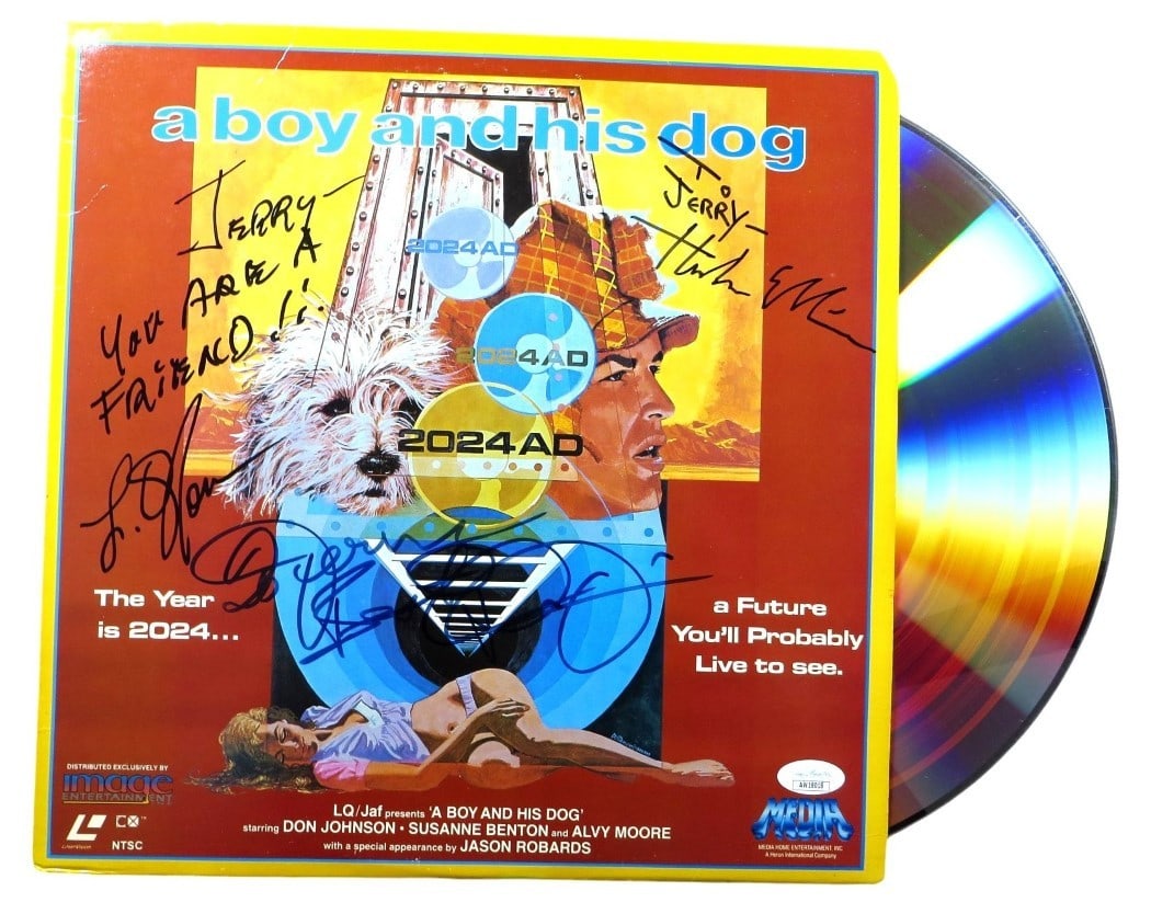 JSA Authenticated A Boy and His Dog Laserdisc Cover Signed by 3: JSA Authenticated A Boy and His Dog Laserdisc Cover Signed by 3 This is an original Laserdisc cover for "A Boy and His Dog" that has been autographed by Don Johnson, LQ Jones, and Harlan Ellison. The 