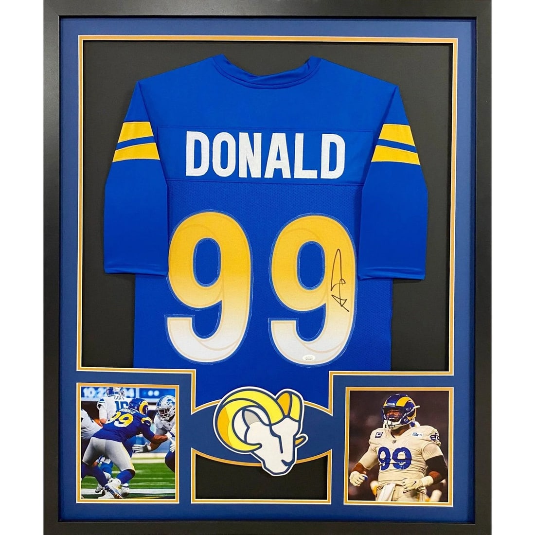 Aaron Donald Signed Framed Jersey Los Angeles Rams JSA Authenticated: Aaron Donald Signed Framed Jersey Los Angeles Rams JSA Authenticated This framed jersey features the autograph of Aaron Donald, a standout player for the Los Angeles Rams. The signature is authenticat