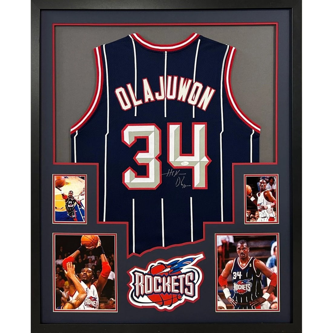 Hakeem Olajuwon Signed Framed Jersey JSA Certified Houston Rockets: Hakeem Olajuwon Signed Framed Jersey JSA Certified Houston Rockets This stunning framed jersey features the iconic Hakeem Olajuwon, a celebrated legend of the Houston Rockets. The jersey is autographe